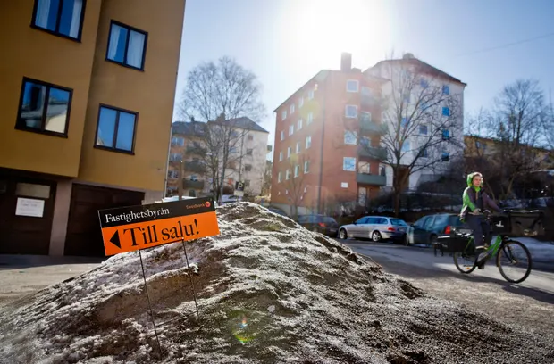 A for sale sign in the street outside residential buildings in the Midsommarkransen neighbourhood of Stockholm, Sweden. Photograph Bloomberg - Getty Images